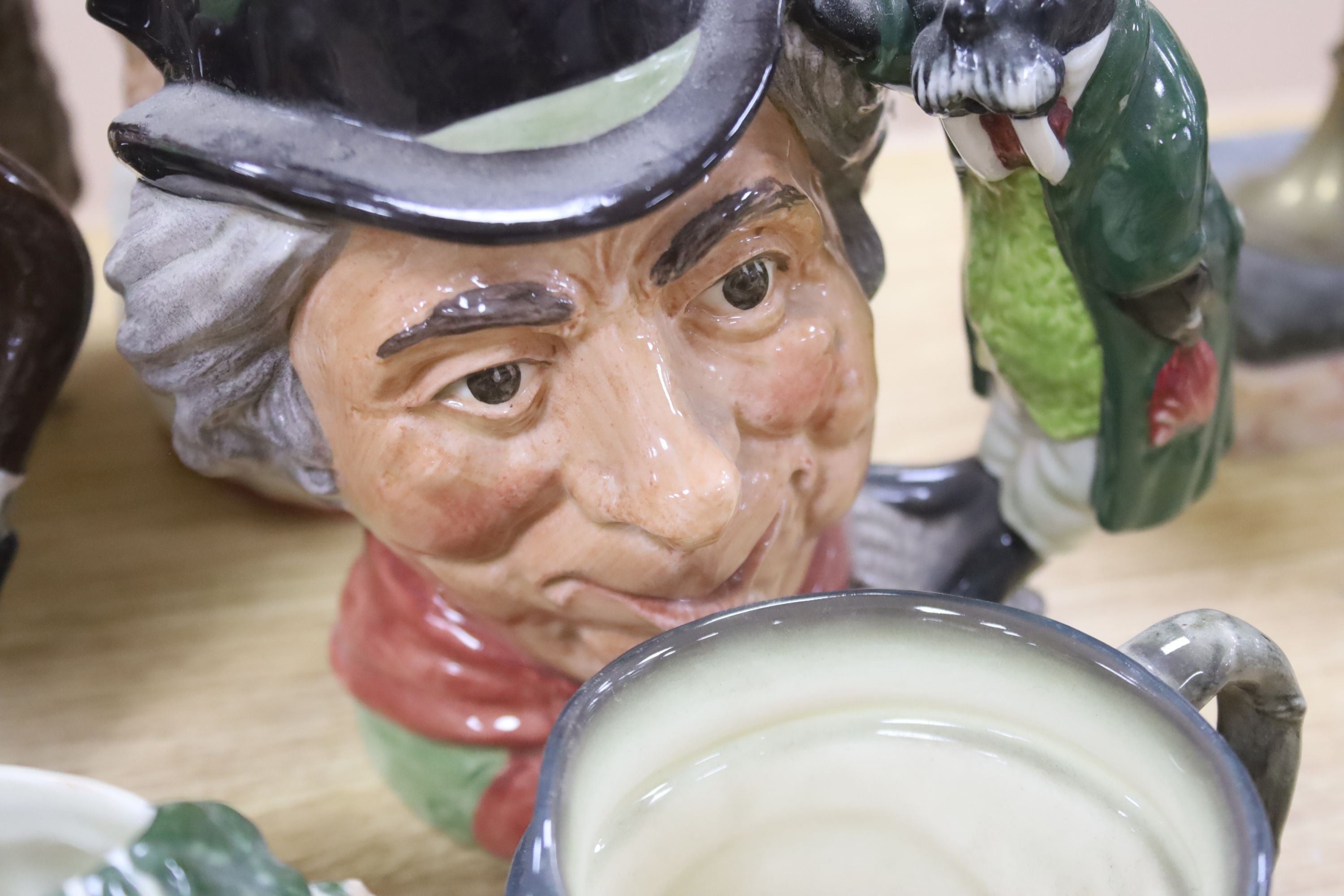 A collection of seventeen Royal Doulton character mugs